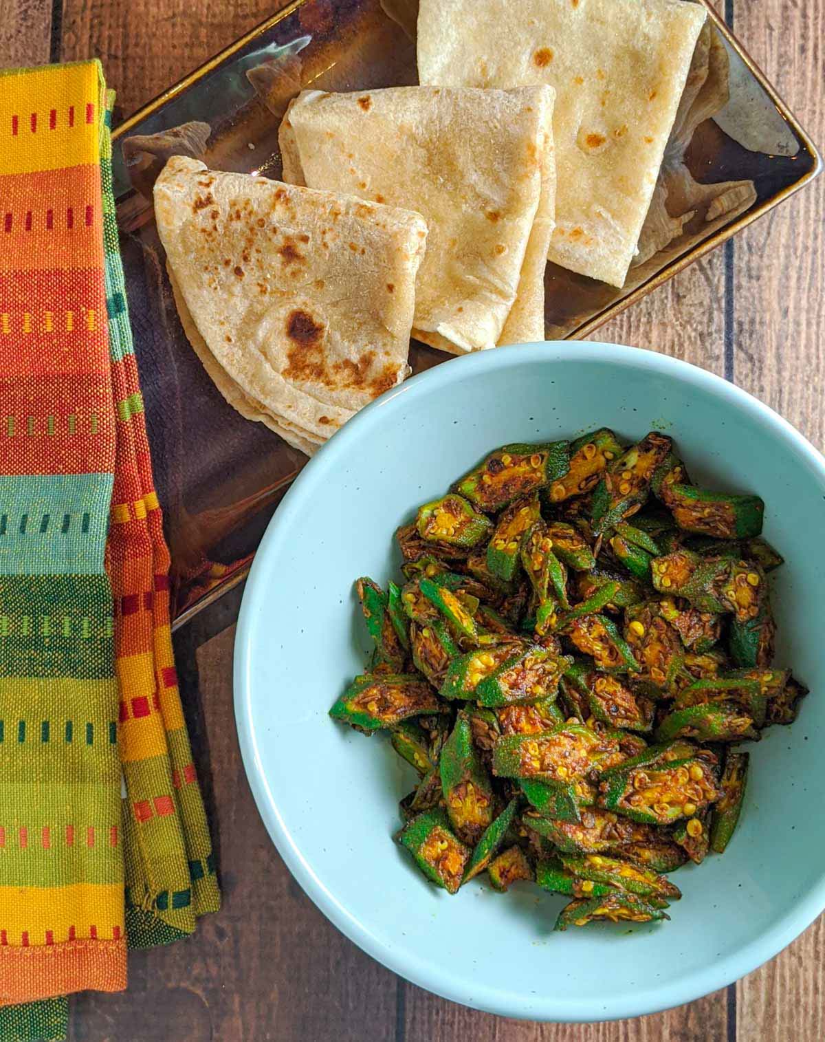 https://cookoverheels.com/wp-content/uploads/2020/01/Dry-Bhindi-Masala-with-Roti.jpg?utm_source=chatgpt.com